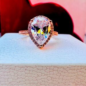 authentic pandora rose gold ,   tear drop ring size  7 comes  with dust bag